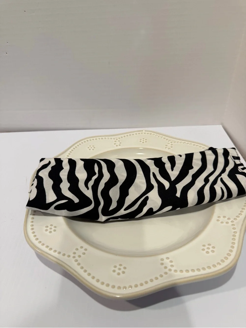 Set of 13 cotton 20x20” Zebra Print Napkins, Black & White, used for a party.